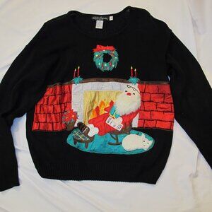 Black Christmas sweater with Santa snoozing by fire  M